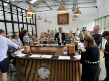 Gin tasting event at 820 Spirits - Andrew Lotery behind bar talking to guests 