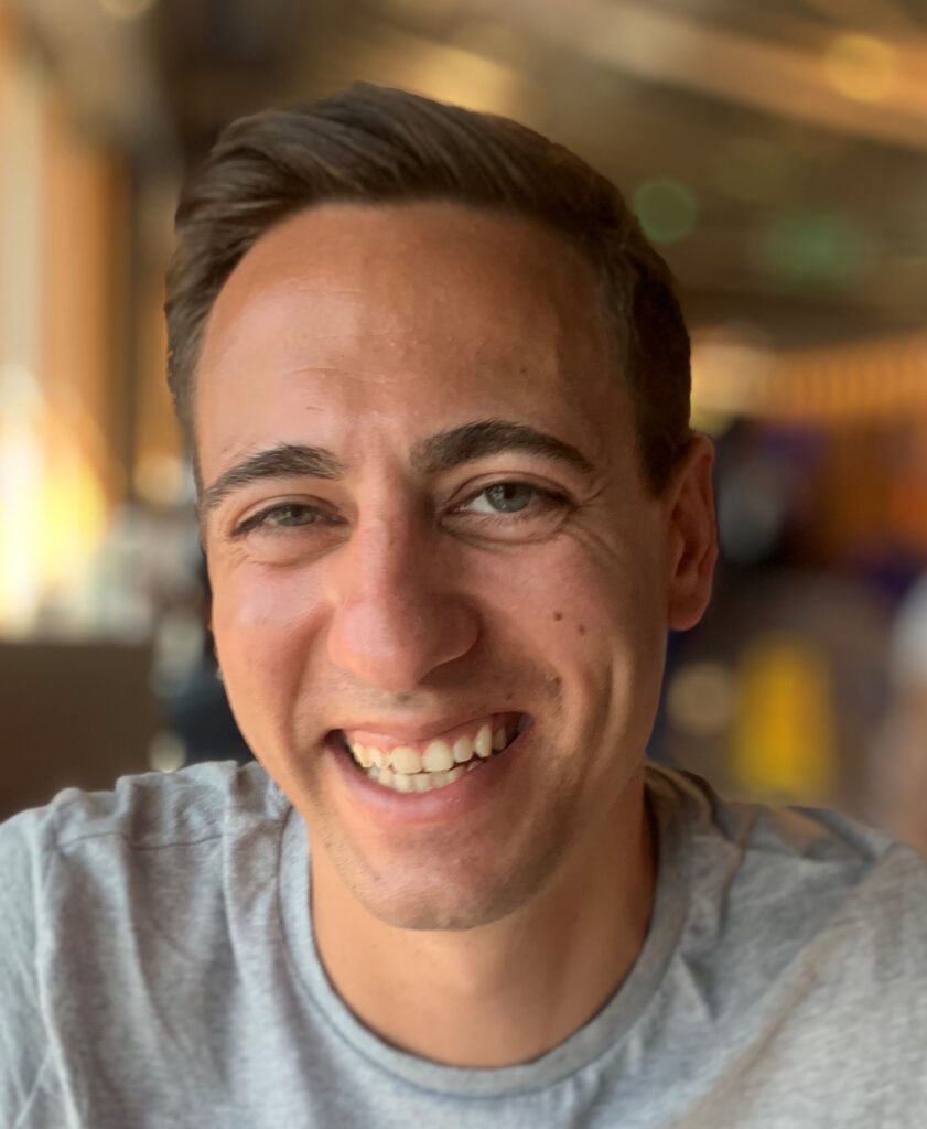 Christopher Shulz - smiling young man looking at the camera